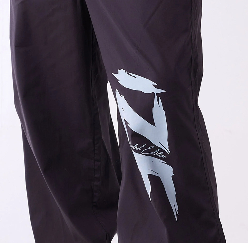 Printed "Limited edition" parachute pants - I Z F