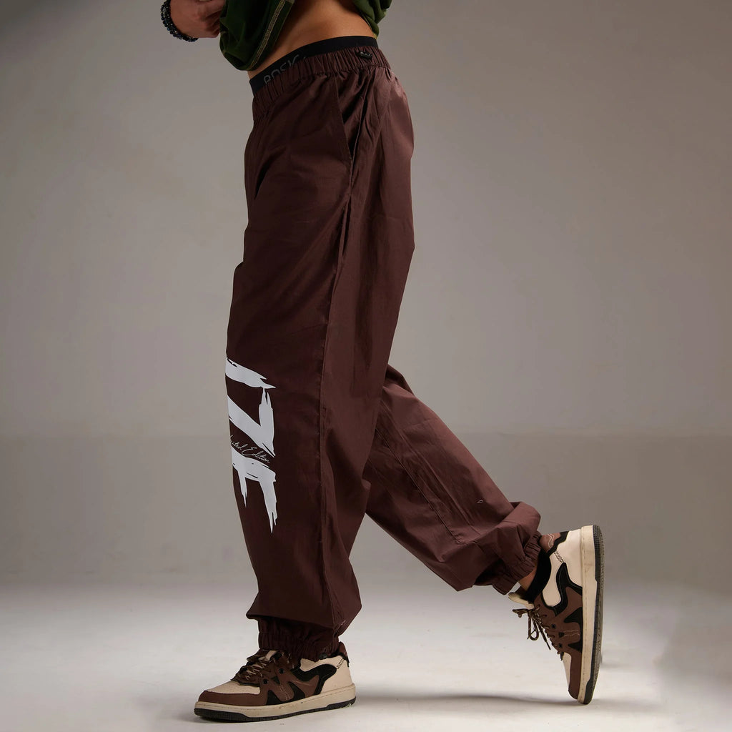 Printed "Limited edition" Parachute Pants for Men in Brown - I Z F